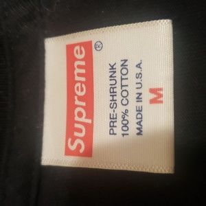 Size M Supreme shirt